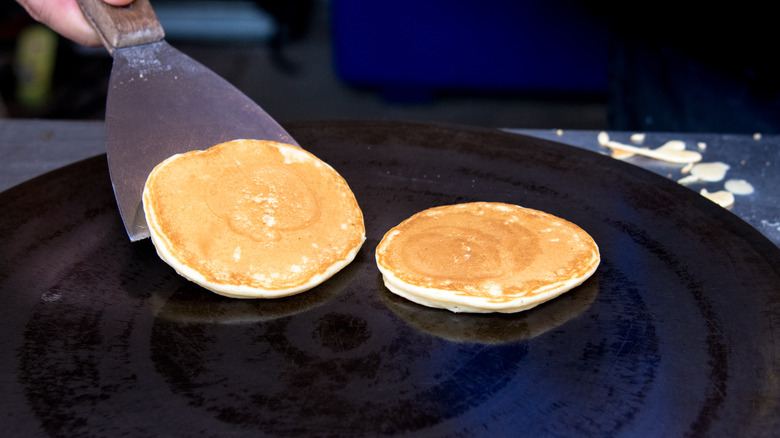 flipping pancake with spatula