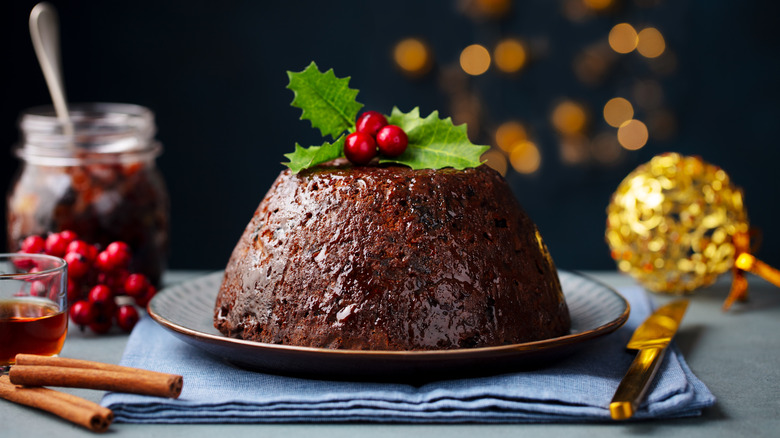 A Christmas pudding with a holly sprig