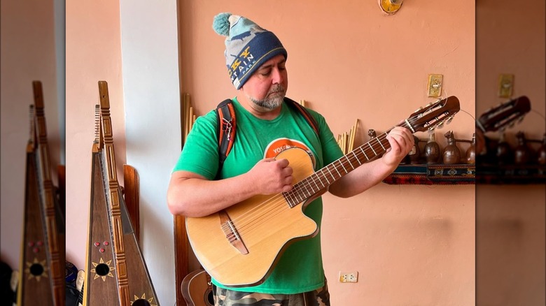 Duff Goldman playing guitar in Peru