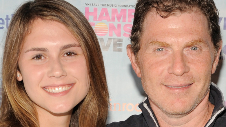 Bobby Flay and Sophie smiling