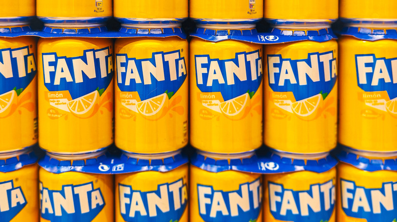 Fanta cans stacked on top of each other