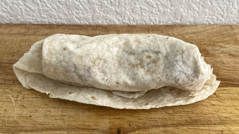 Bacon Ranch Queso Wrap on cutting board