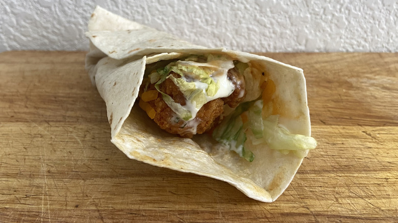 Crispy Crispy Jack Wrap on cutting board