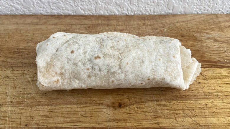 Southwest Crunch Queso Wrap on cutting board