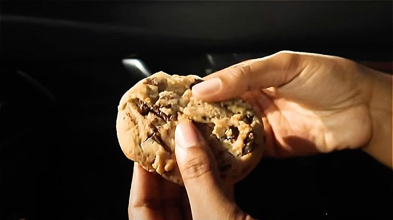 Person holding Whataburger cookie