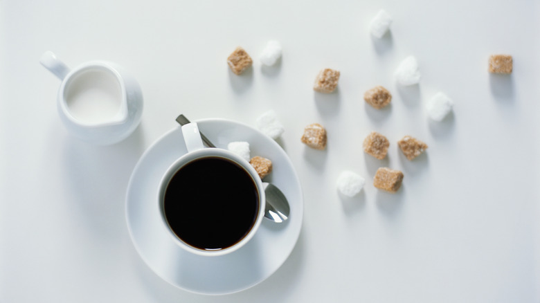 sugar cubes around coffee 