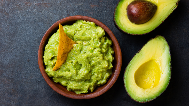 guacamole with avocado halves