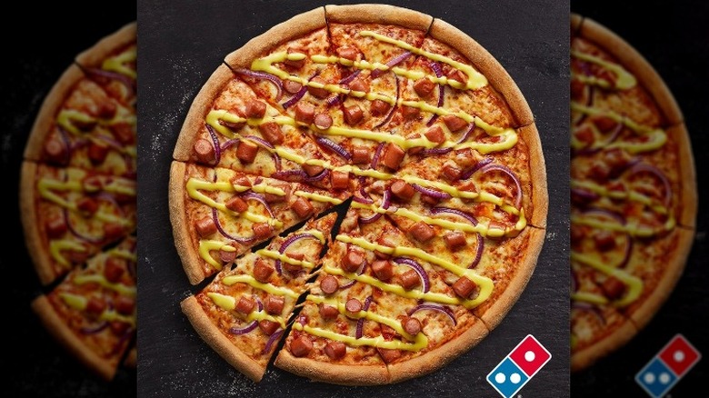 Hot dog pizza on counter