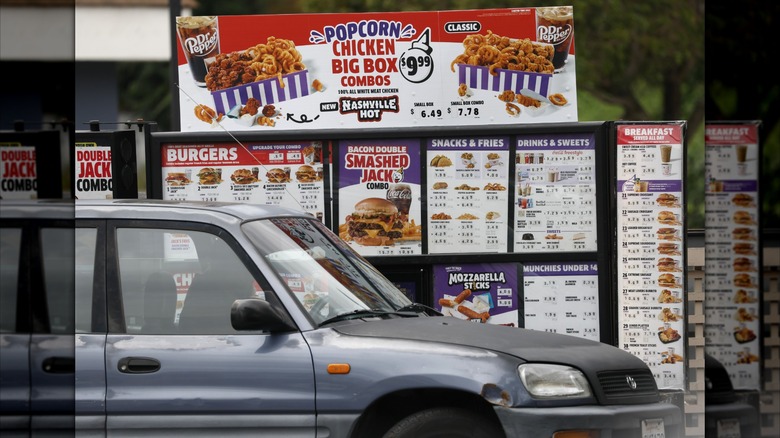 Car pulling up to Jack in the Box drive-thru