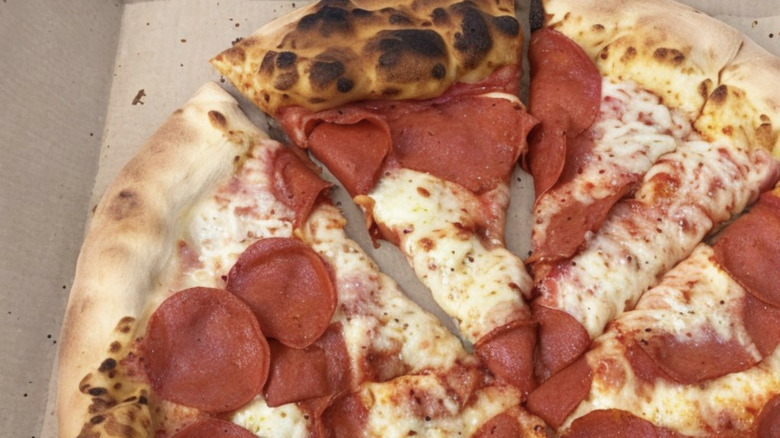 Chuck E. Cheese pepperoni pizza burned