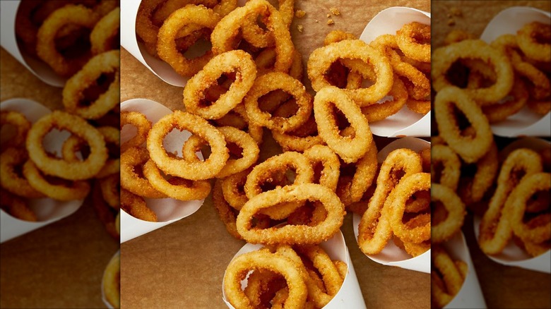 Burger King's onion rings spilling out of five containers