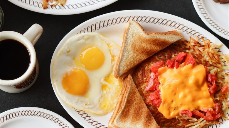 Waffle House meal with eggs, toast, cheese, hash browns, and coffee