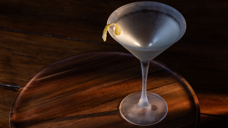Chilled martini cocktail with a lemon twist