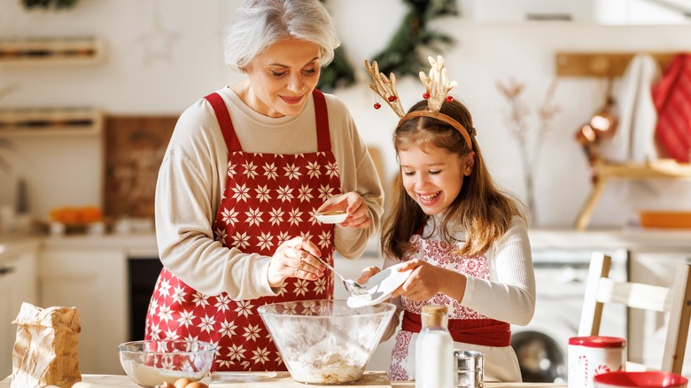 grandma and child holiday cooking
