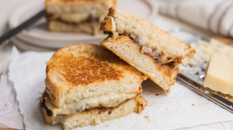 sliced grilled cheese on plate 