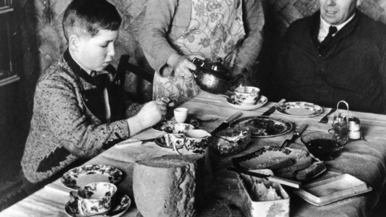 Vintage photo of family at breakfast