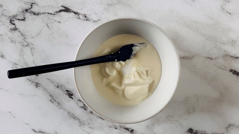 Heavy cream and sour cream in bowl