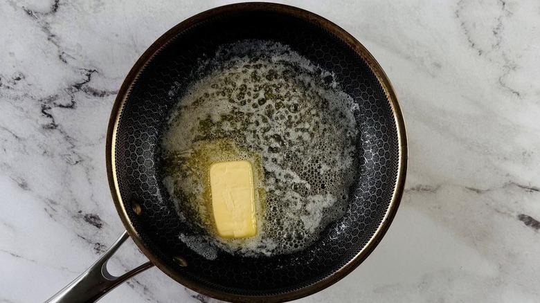 Butter melting in pan