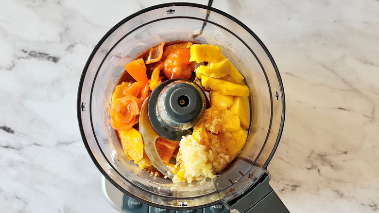 Mango habanero sauce ingredients in food processor