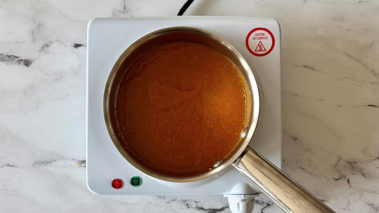 Mango habanero sauce in saucepan