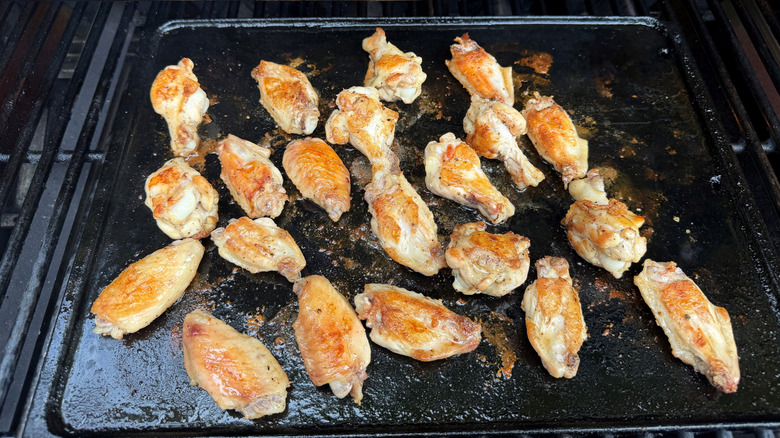 Chicken wings on grill
