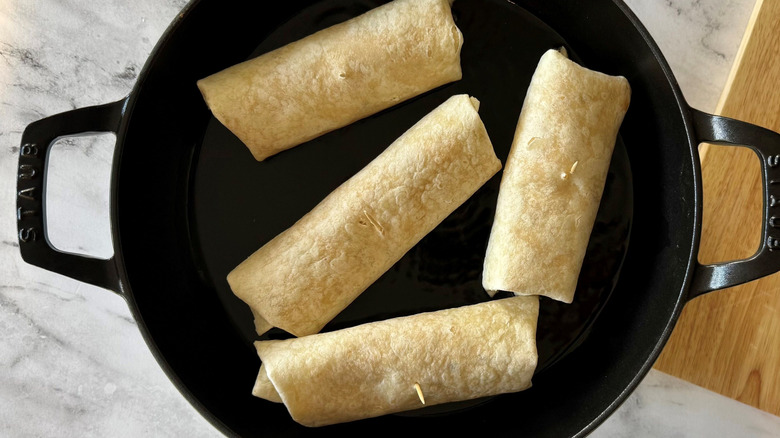 Tortilla wraps in large skillet
