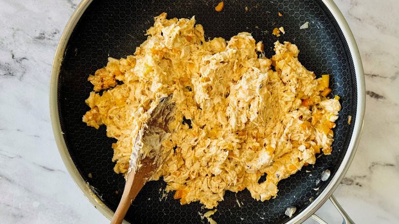 Cheesy chicken mixture in pan