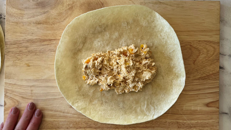 Chicken cheese filling in tortilla