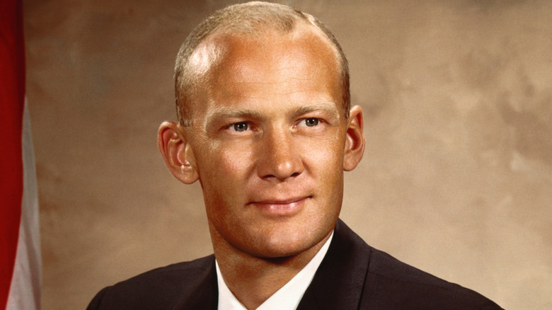 Portrait of young Buzz Aldrin wearing a suit jacket.