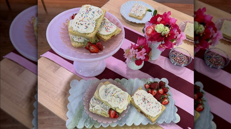 The Cake Shop Bakery's popped tarts on display on a table and cake plate