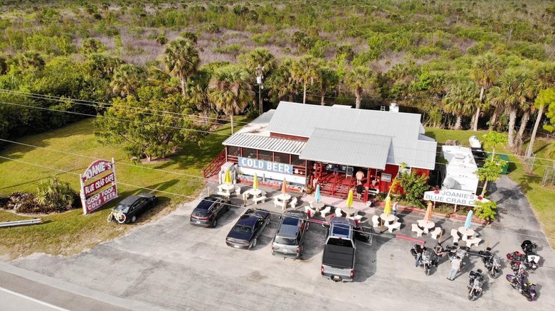 Exterior of Joanie's Blue Crab Cafe with Everglades in the background