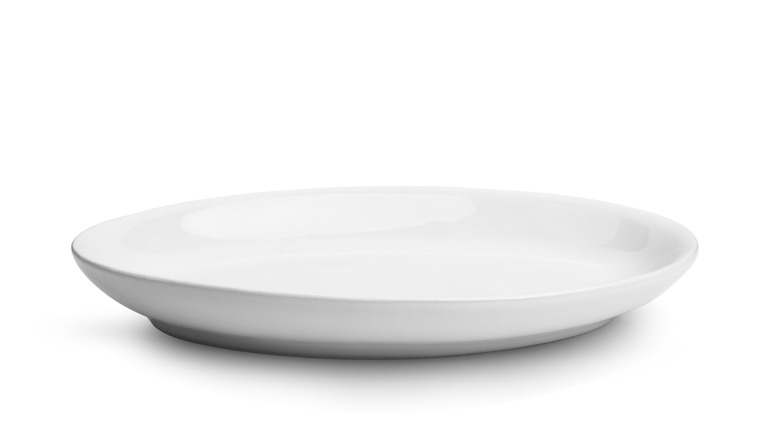 An empty and clean plate on a table