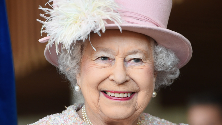 Queen Elizabeth in pink hat