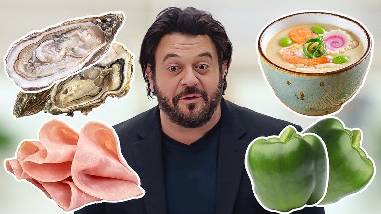 Adam Richman surrounded by food