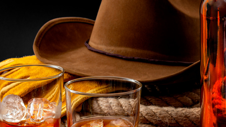 cowboy hat and drinks 
