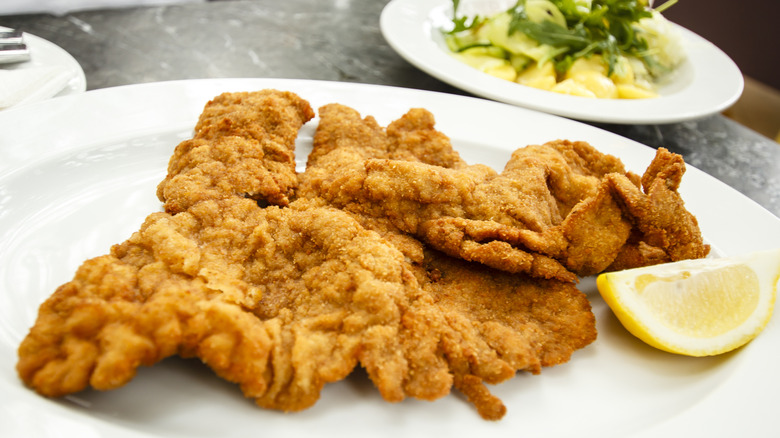 Wiener schnitzel with lemon wedge