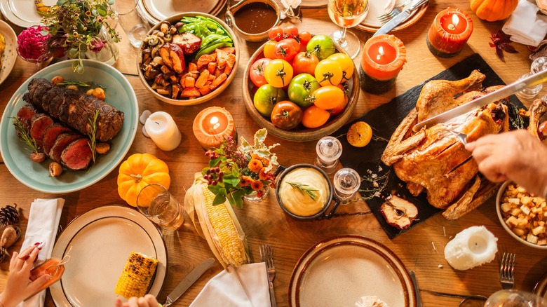 holiday feast with steak and turkey