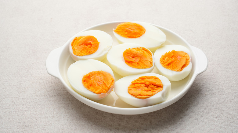 Three hard-boiled eggs cut in halves
