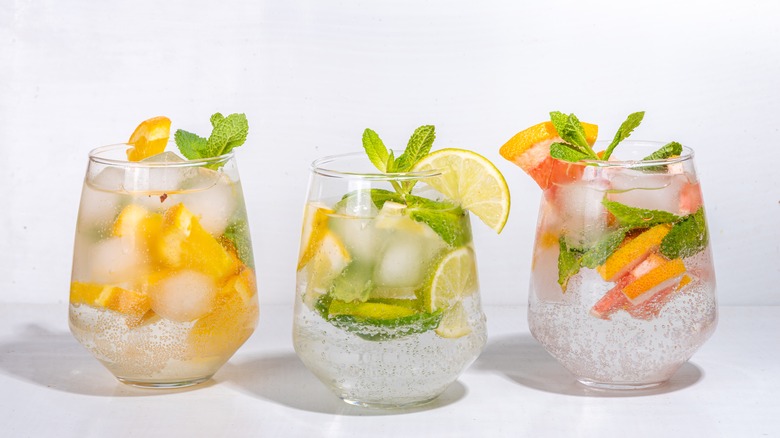 Three sparkling fruit drinks