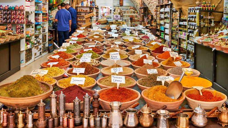 Whole spices on display in a market