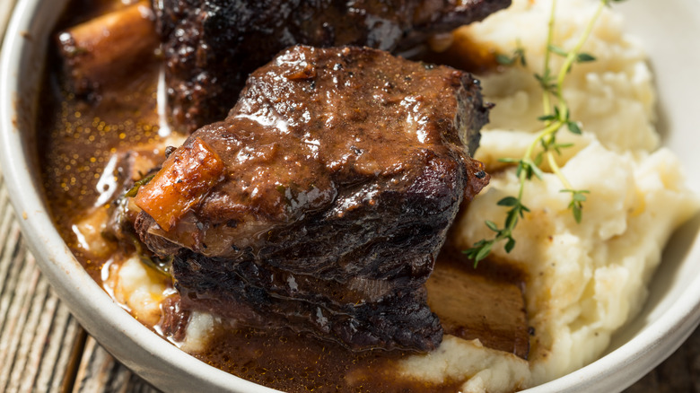 Braised beef short ribs in bowl