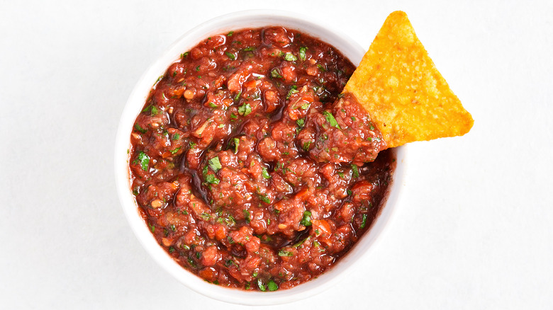 Bowl of salsa with chip