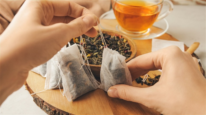 Putting tea in a teabag