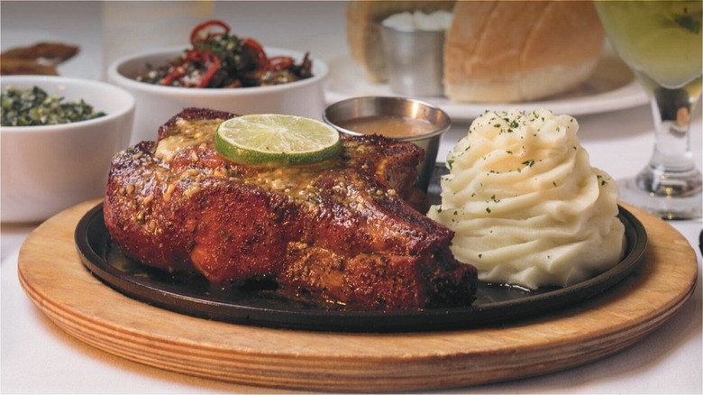 Ad for Perry's Steakhouse & Grille pork chop