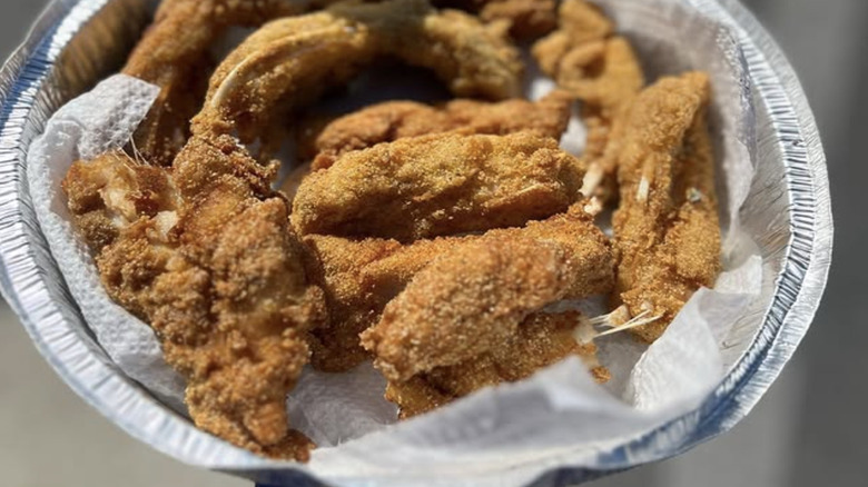 Aluminum pie plate with battered buffalo fish ribs