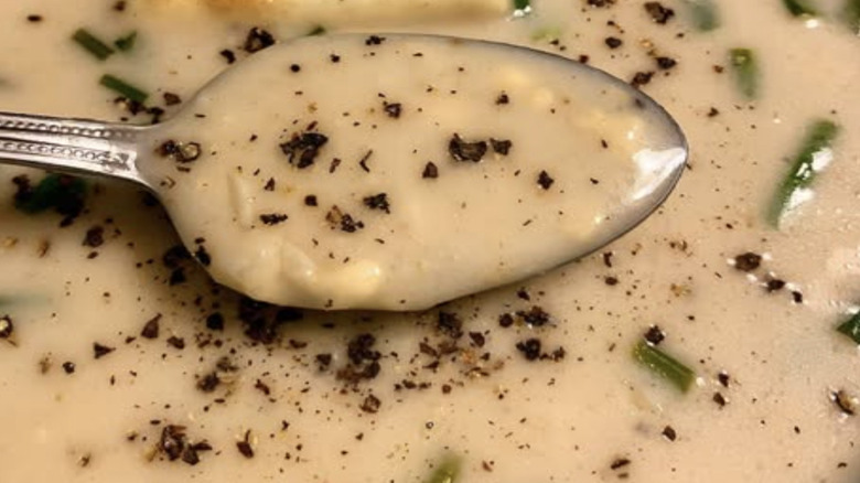 Close-up of cottage cheese soup with chives
