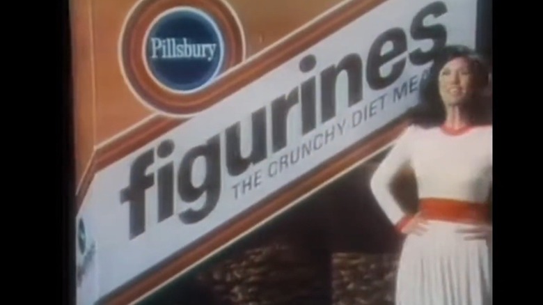 Woman poses in front of a box of Pillsbury Figurines in 1970s commercial