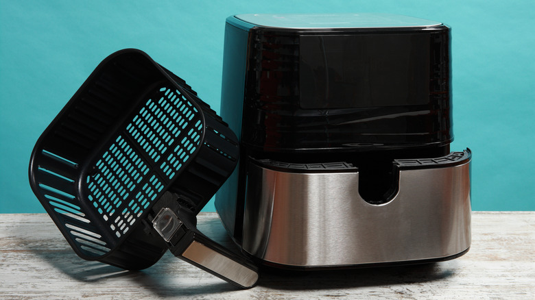 Basket air fryer on a kitchen counter