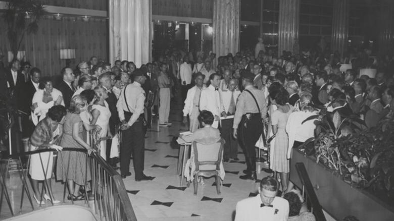 Frank Sinatra swarmed by guests at La Ronde Supper Club