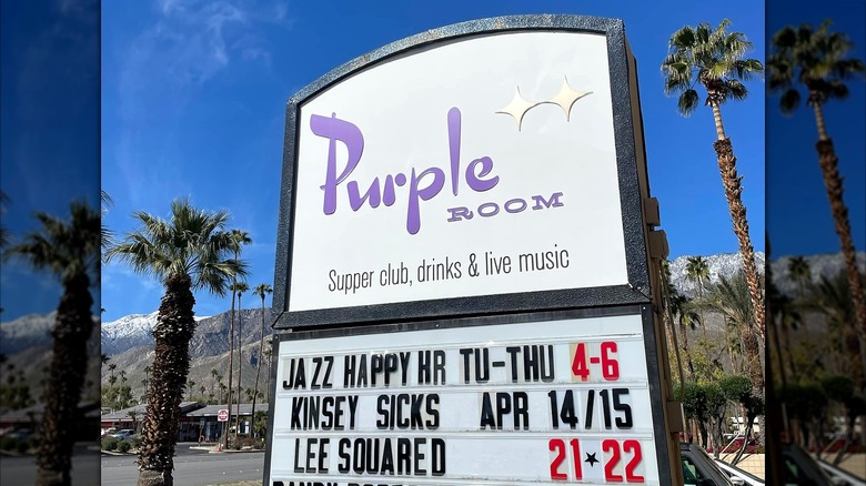 Sign for Purple Room Supper Club advertising upcoming performances.
